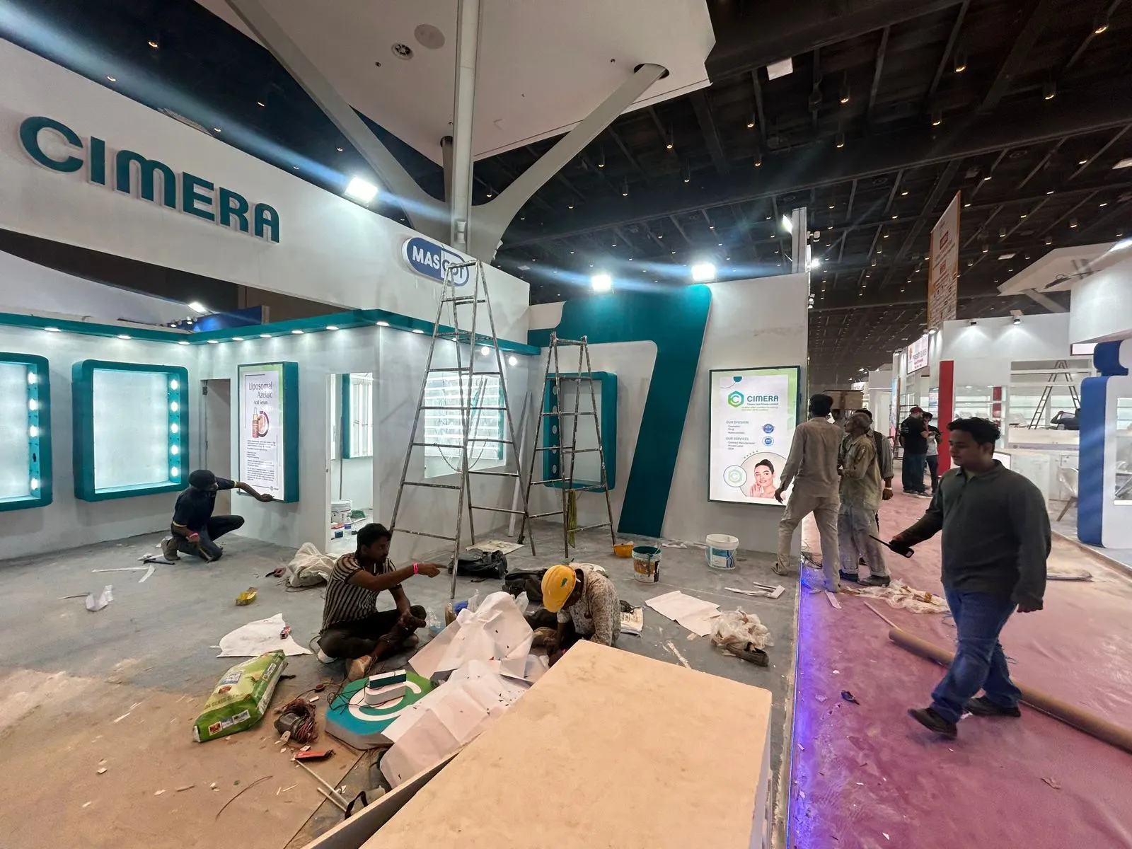 Management Touch crew building the Cimera Care stall on site at CPHI